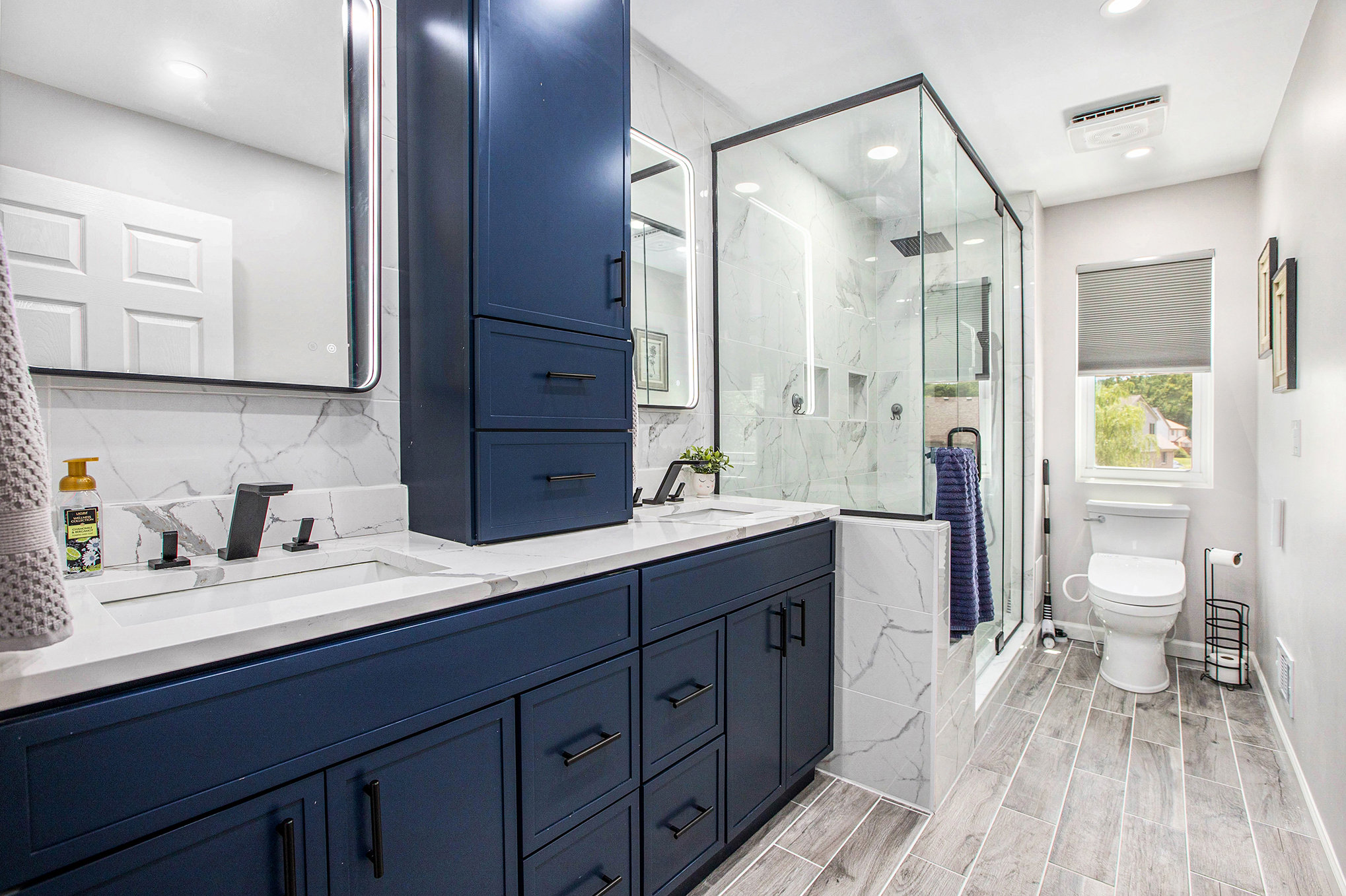 Luxury navy bathroom with marble